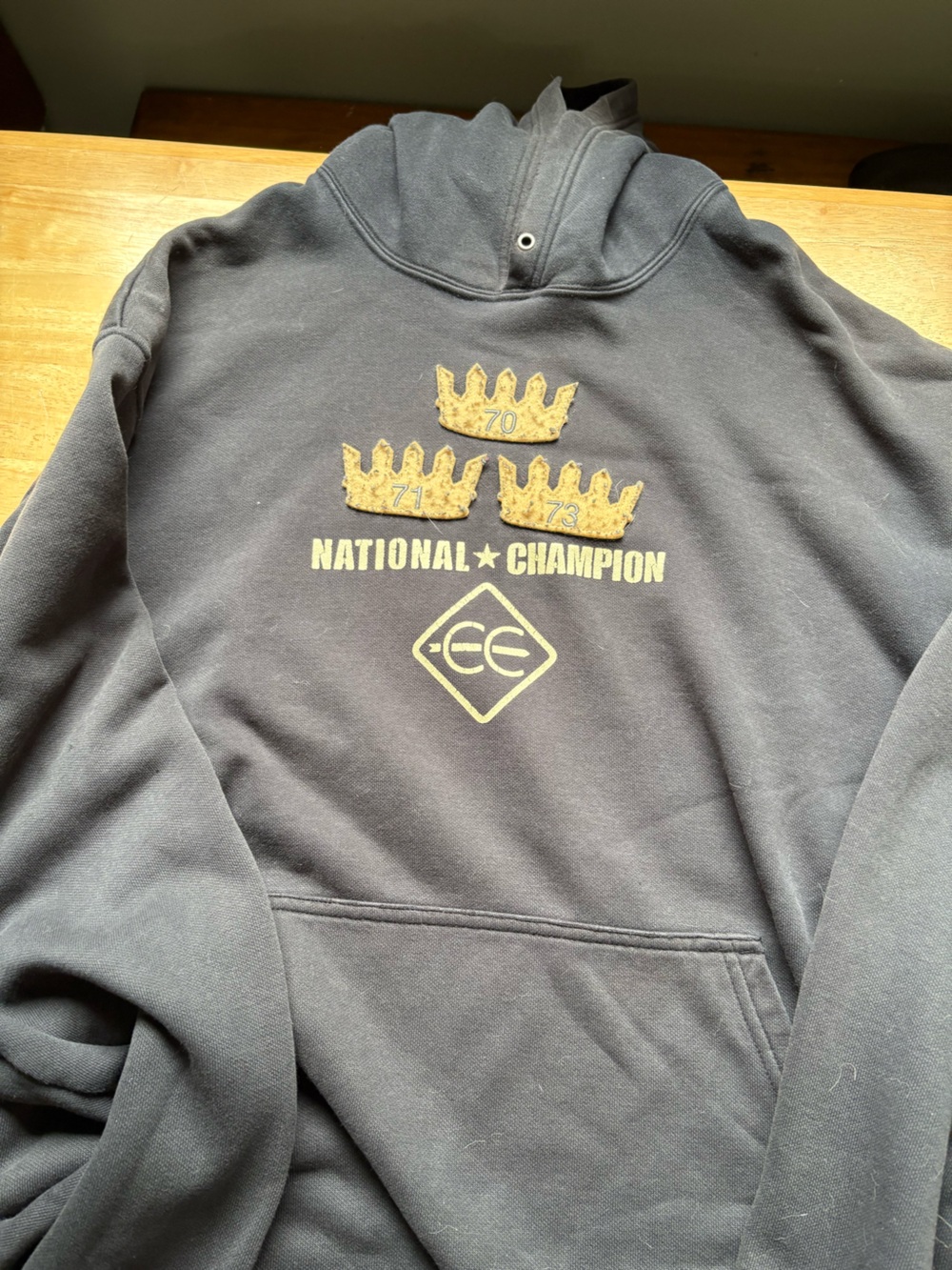Nike Black Pullover Hoodie with Gold Crown Graphics
